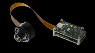 CS-101 space camera on black background